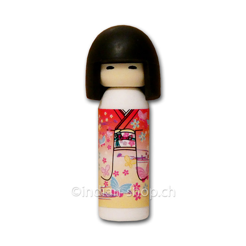 Iwako Radiergummi in Form einer japanischen Kokeshi-Puppe mit rotem und gelbem Kimono, Blumen- und Schmetterlingsmotiven, Höhe 4,5 cm.