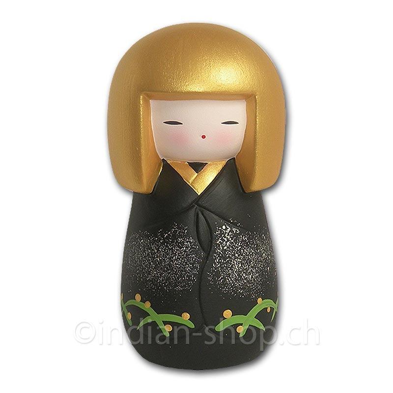 Japanische Kokeshi-Puppe mit goldfarbener Frisur und schwarzem Gewand mit Pflanzenmotiv