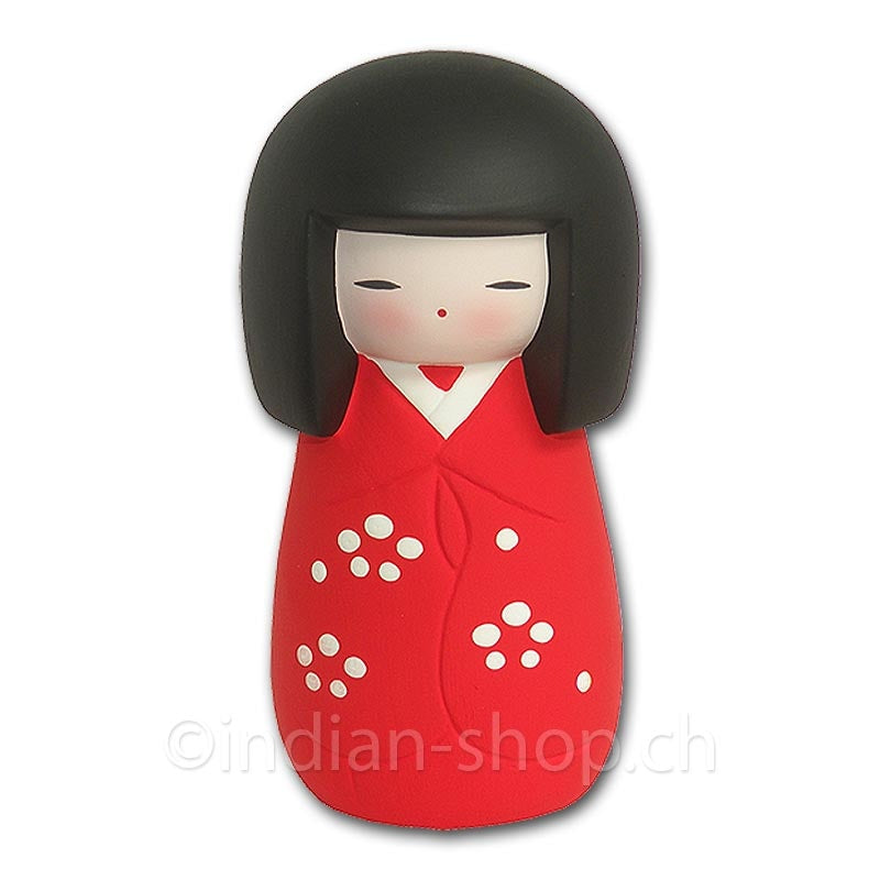 Japanische Kokeshi-Puppe aus Keramik mit rotem Gewand, weissen Blüten und schwarzen Haaren