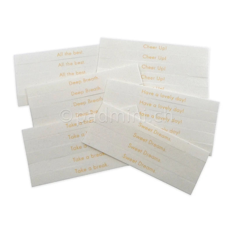 Kunjudo Washi Incense Papierstreifen in fünf Duftvarianten mit den Aufschriften All the best, Deep Breath, Take a break, Cheer Up, Have a lovely day und Sweet Dreams.