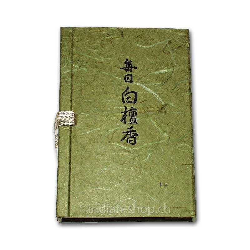 Nippon Kodo Byakudan Geschenkbox mit japanischen Sandelholz-Räucherstäbchen in dekorativer grüner Verpackung.